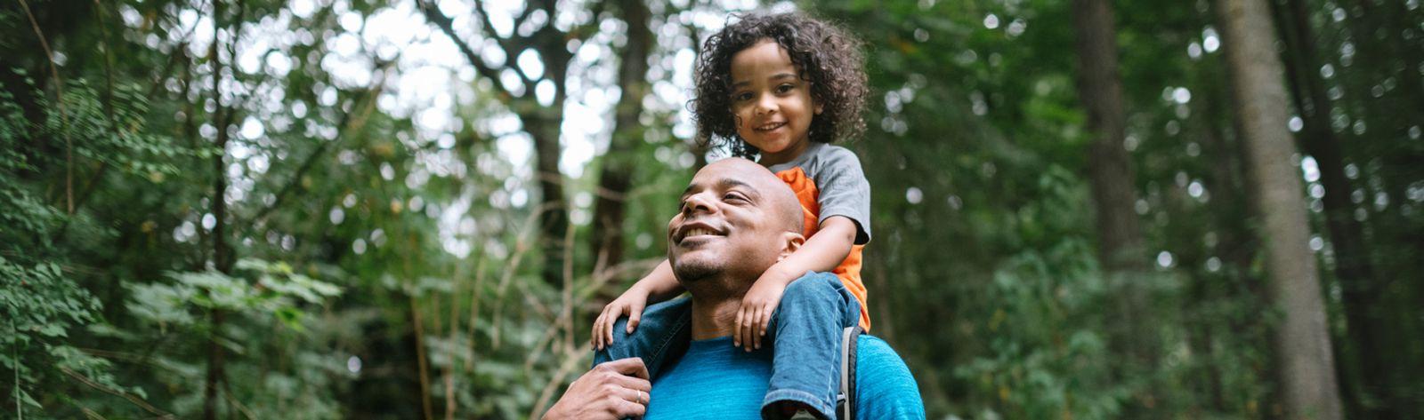 Dad hiking with son